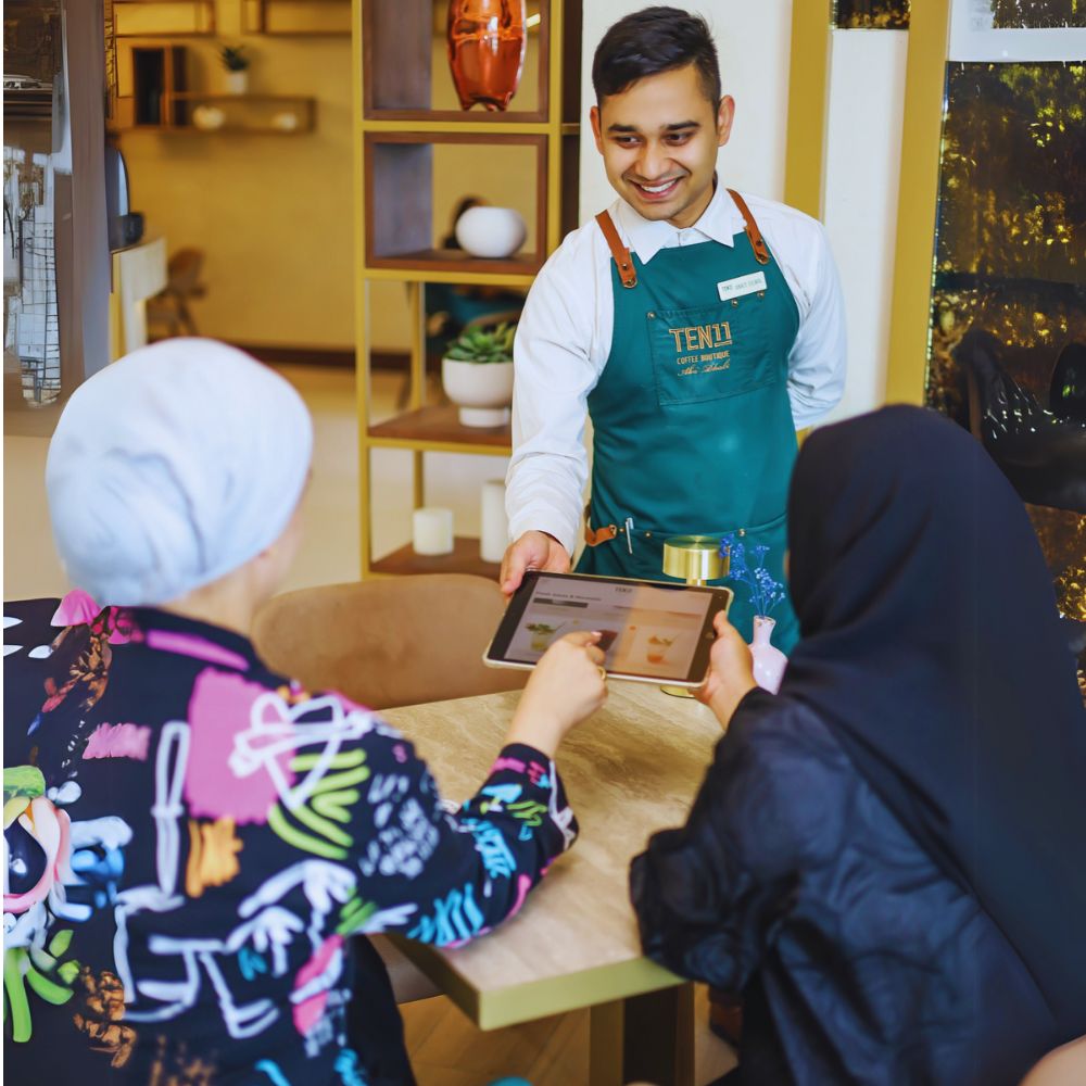 waiter serving in cafe